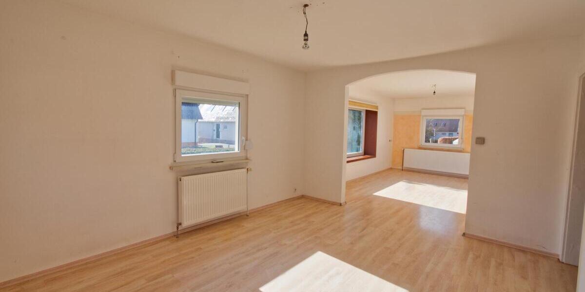 Wohnen im Grünen: Gepflegtes Siedlungshaus mit idyllischem Garten im beliebten Wohngebiet 