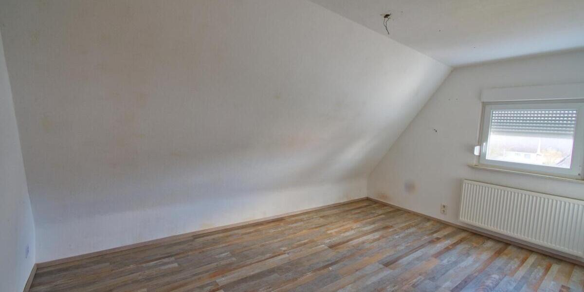 Wohnen im Grünen: Gepflegtes Siedlungshaus mit idyllischem Garten im beliebten Wohngebiet 