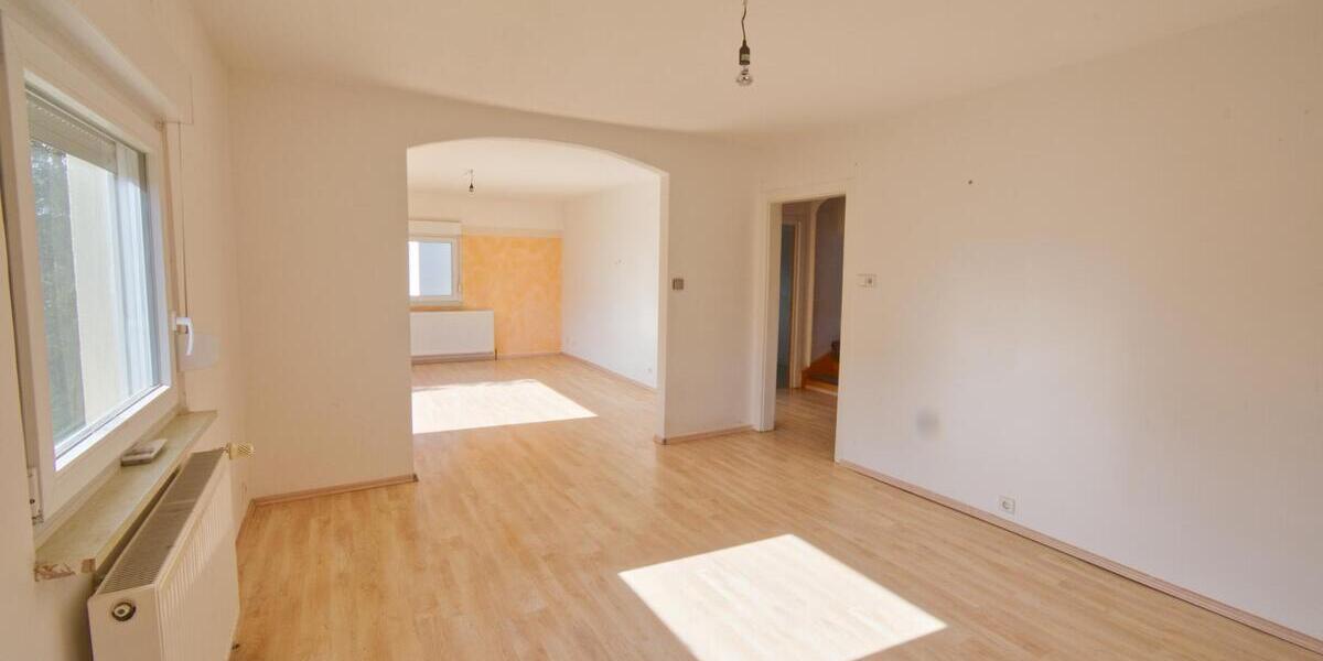 Wohnen im Grünen: Gepflegtes Siedlungshaus mit idyllischem Garten im beliebten Wohngebiet 