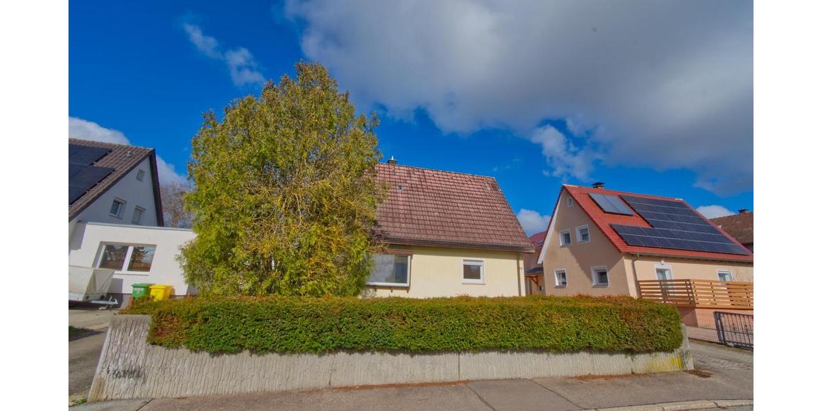 Wohnen im Grünen: Gepflegtes Siedlungshaus mit idyllischem Garten im beliebten Wohngebiet 
