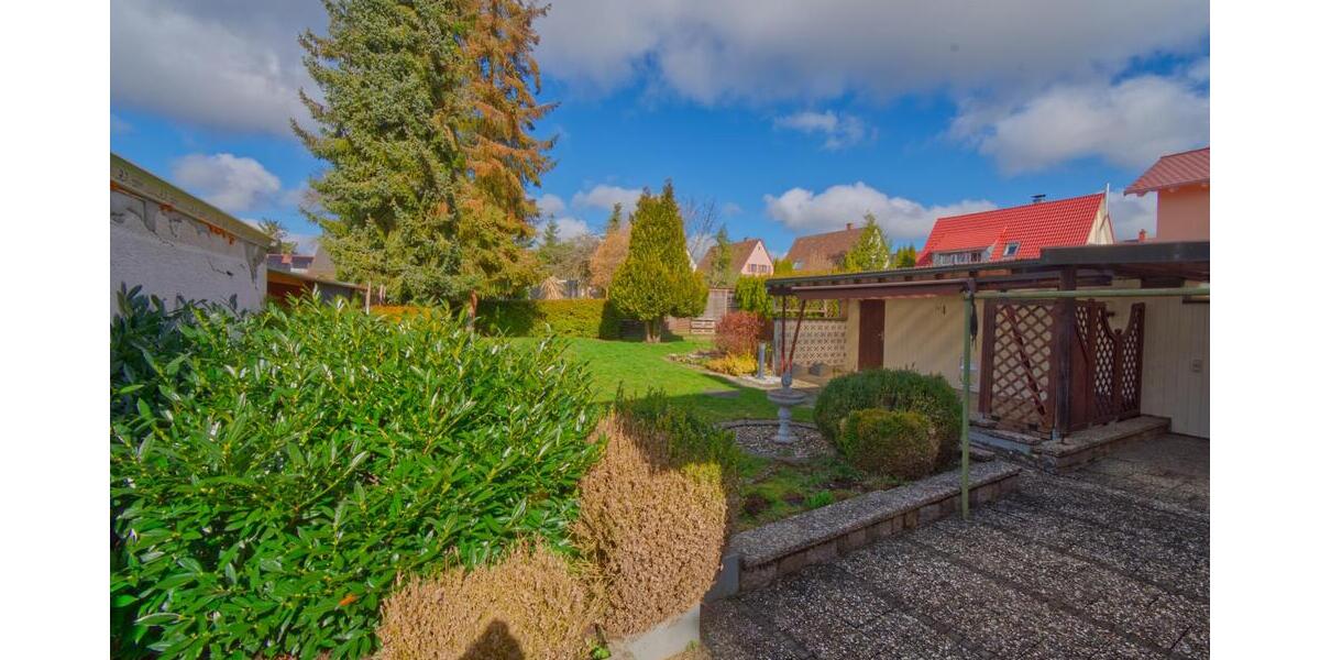 Wohnen im Grünen: Gepflegtes Siedlungshaus mit idyllischem Garten im beliebten Wohngebiet 