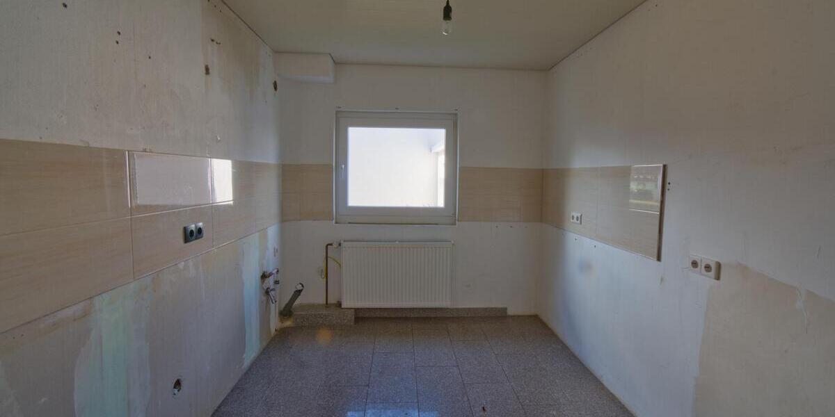 Wohnen im Grünen: Gepflegtes Siedlungshaus mit idyllischem Garten im beliebten Wohngebiet 