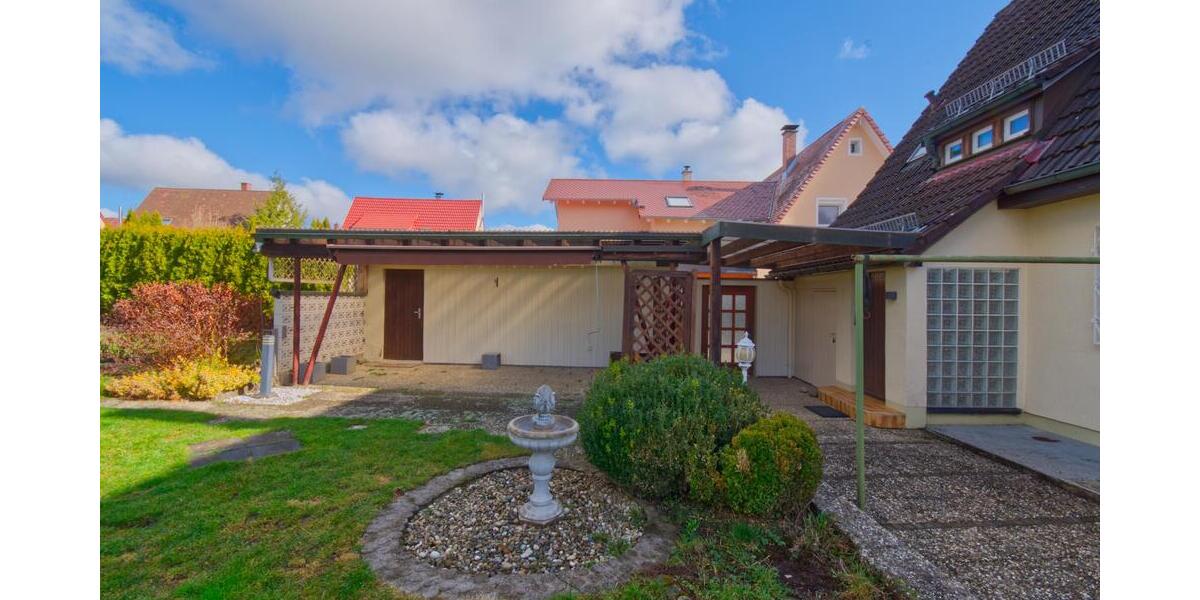 Wohnen im Grünen: Gepflegtes Siedlungshaus mit idyllischem Garten im beliebten Wohngebiet 