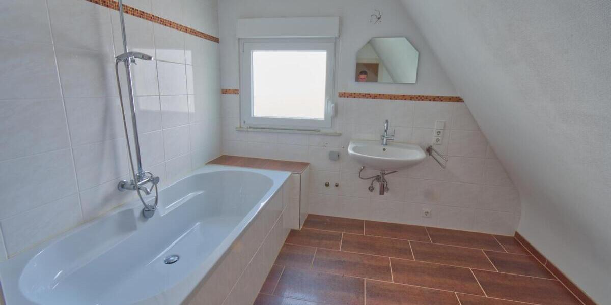 Wohnen im Grünen: Gepflegtes Siedlungshaus mit idyllischem Garten im beliebten Wohngebiet 