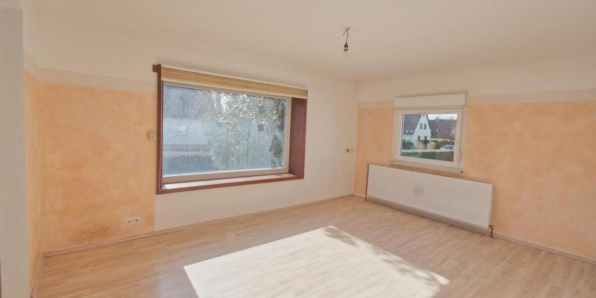 Wohnen im Grünen: Gepflegtes Siedlungshaus mit idyllischem Garten im beliebten Wohngebiet 