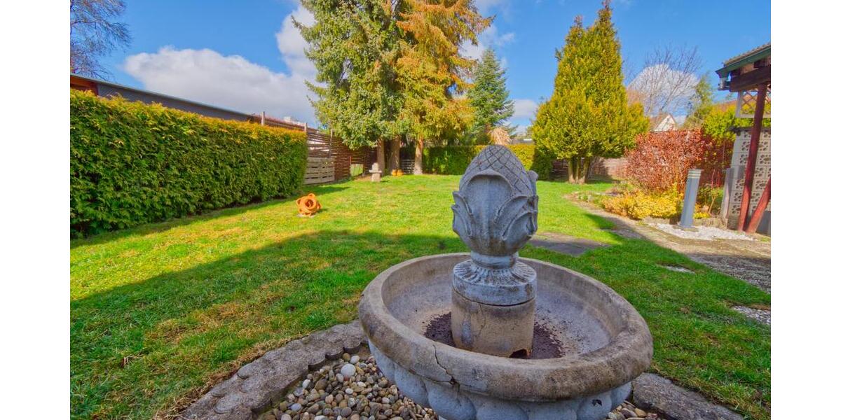 Wohnen im Grünen: Gepflegtes Siedlungshaus mit idyllischem Garten im beliebten Wohngebiet 