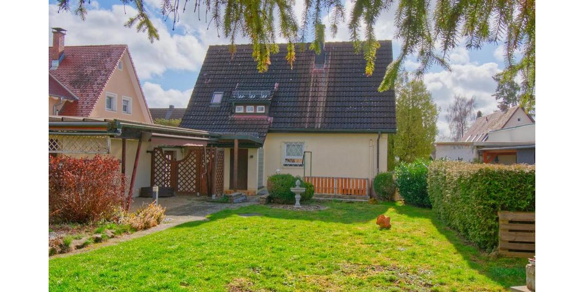 Wohnen im Grünen: Gepflegtes Siedlungshaus mit idyllischem Garten im beliebten Wohngebiet 