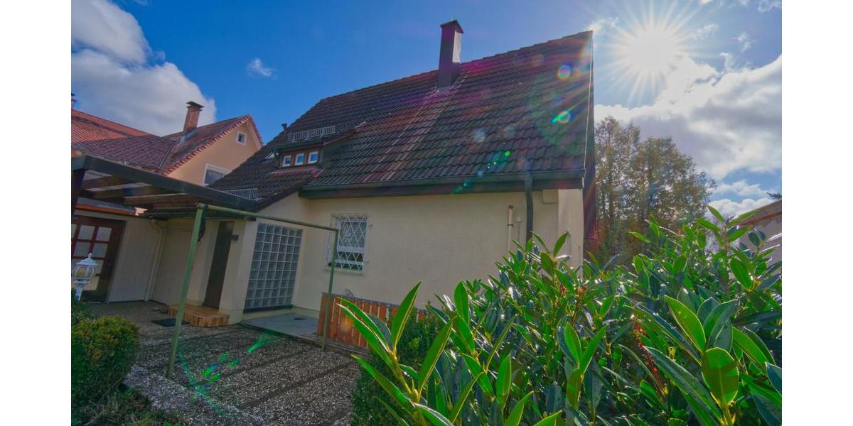 Wohnen im Grünen: Gepflegtes Siedlungshaus mit idyllischem Garten im beliebten Wohngebiet 